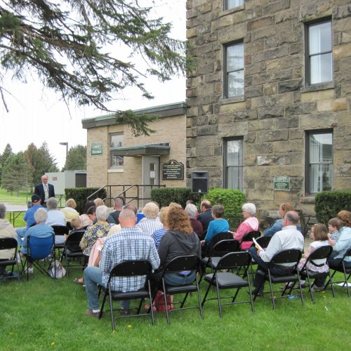 Photo of a speaker at the Cattaraugus County Historical Museum